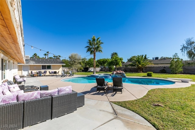 view of swimming pool with an outdoor hangout area, a yard, and a patio area