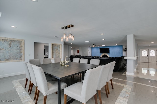 dining room featuring ceiling fan