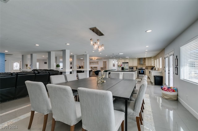 dining area with light tile patterned flooring