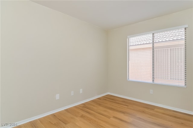 empty room with light wood-type flooring