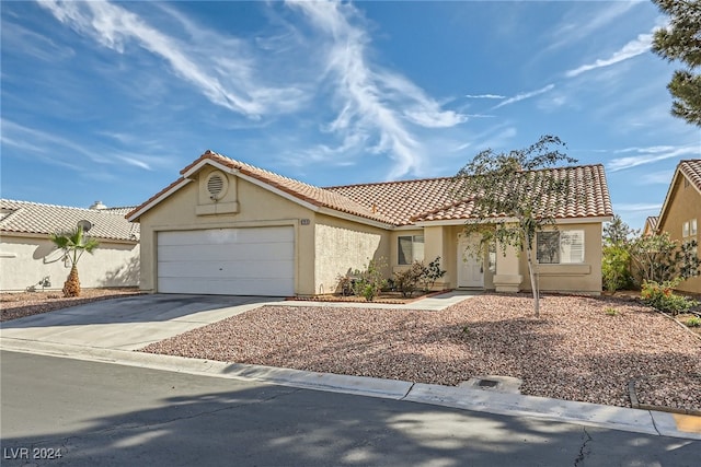 view of front of property featuring a garage