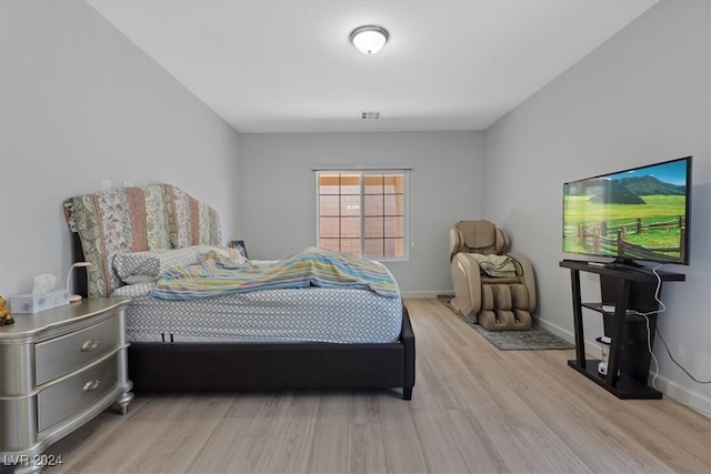 bedroom featuring light hardwood / wood-style flooring