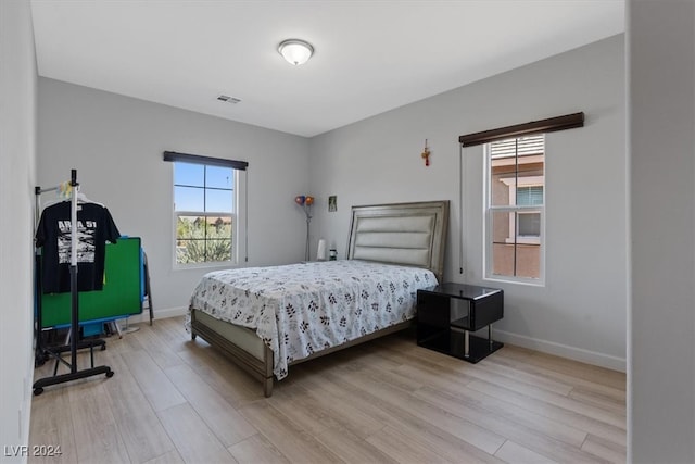 bedroom featuring light hardwood / wood-style floors