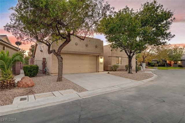 view of front of home with a garage