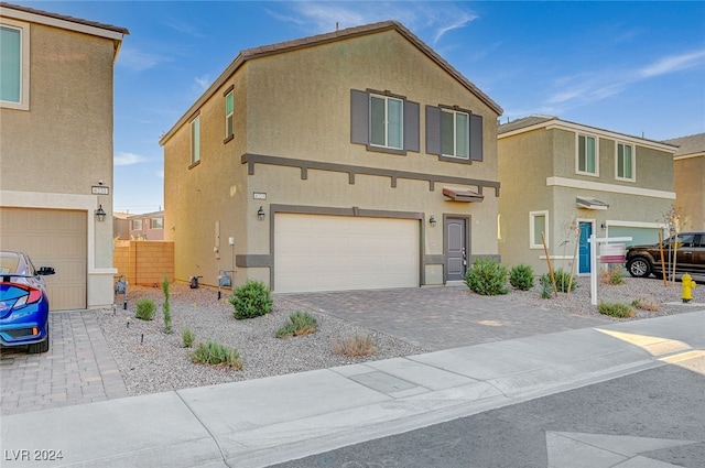 view of front of home with a garage