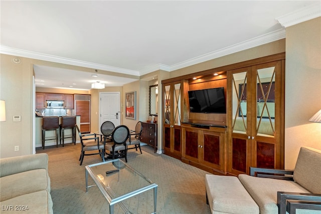 carpeted living room with ornamental molding