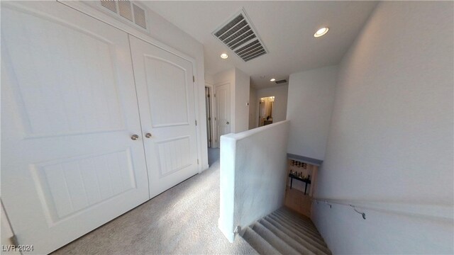 hallway featuring hardwood / wood-style flooring