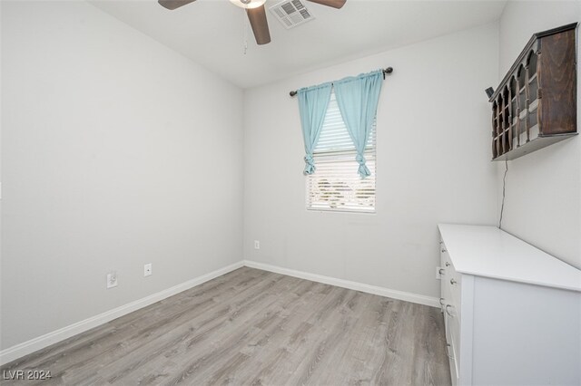 2675 Chinaberry Hill St, Laughlin, NV 89029 - unfurnished room featuring ceiling fan, light wood-type flooring, and baseboards