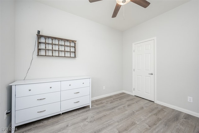 unfurnished bedroom featuring ceiling fan and light hardwood / wood-style floors