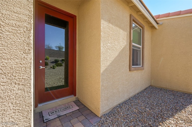 2675 Chinaberry Hill St, Laughlin, NV 89029 - doorway to property with stucco siding