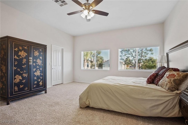 carpeted bedroom featuring ceiling fan