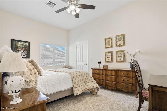 bedroom with ceiling fan and carpet floors