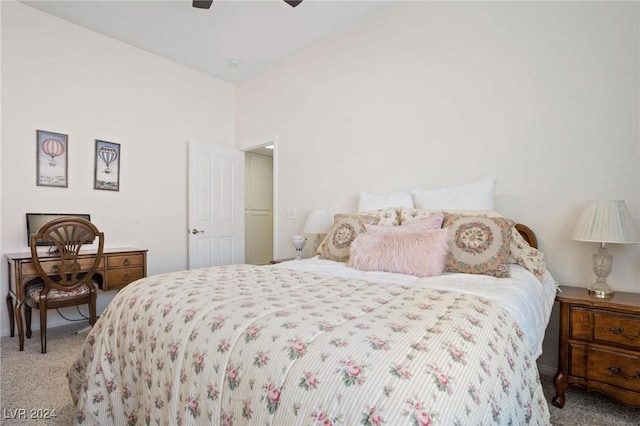 bedroom with ceiling fan and light carpet