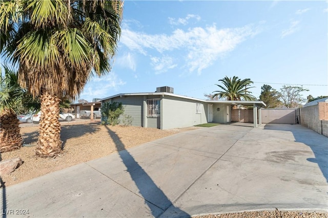 ranch-style house with a carport