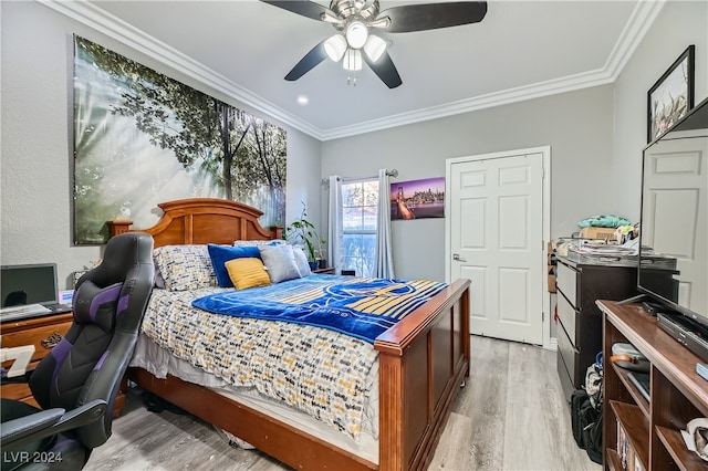 bedroom with ceiling fan, light wood-type flooring, and ornamental molding