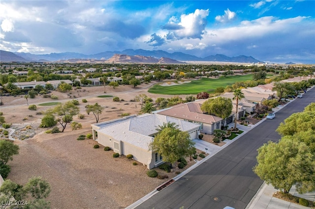 birds eye view of property featuring a mountain view