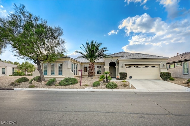 view of front of property featuring a garage