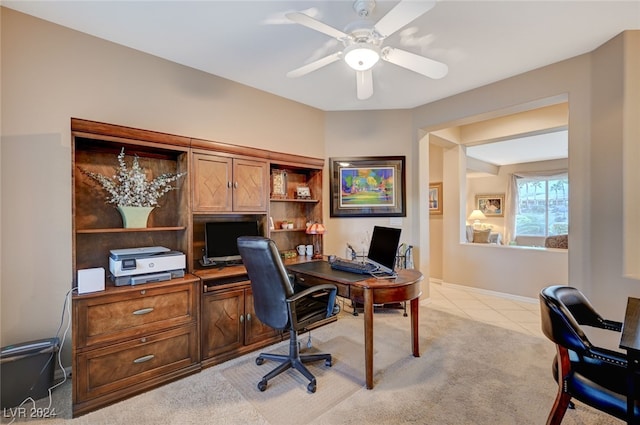 home office featuring ceiling fan and light tile patterned floors