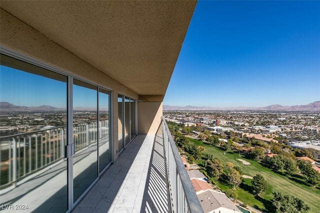 balcony featuring a mountain view