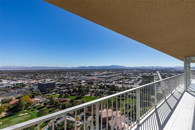 balcony featuring a mountain view