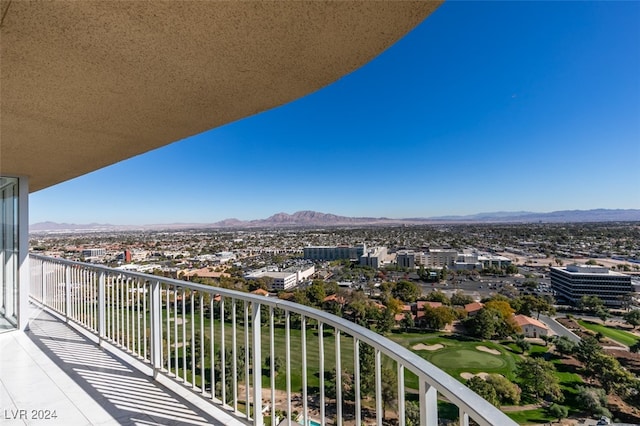 balcony featuring a mountain view