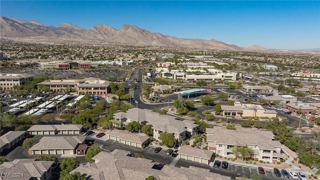 drone / aerial view with a residential view and a mountain view