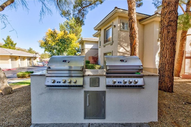 view of patio / terrace with exterior kitchen and area for grilling