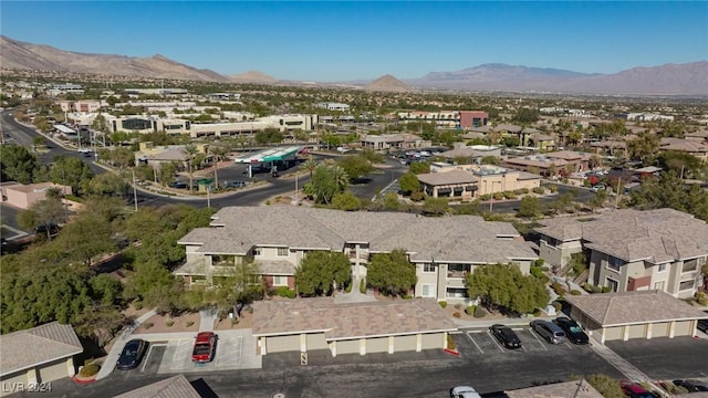 bird's eye view featuring a residential view and a mountain view