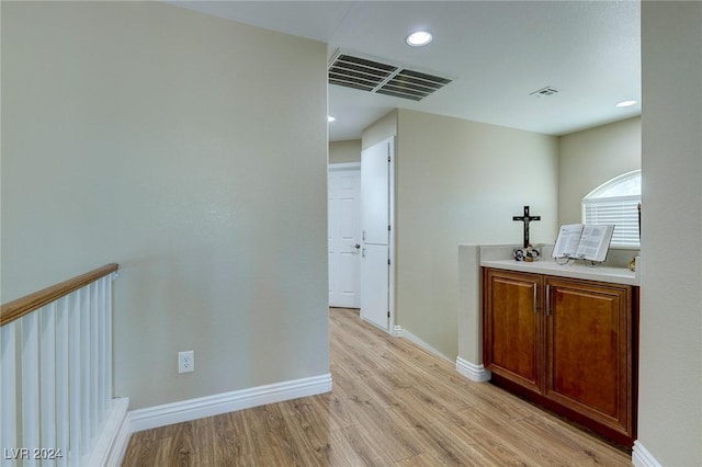 hall featuring light hardwood / wood-style floors