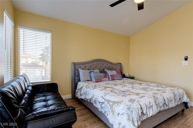 bedroom with ceiling fan and hardwood / wood-style floors