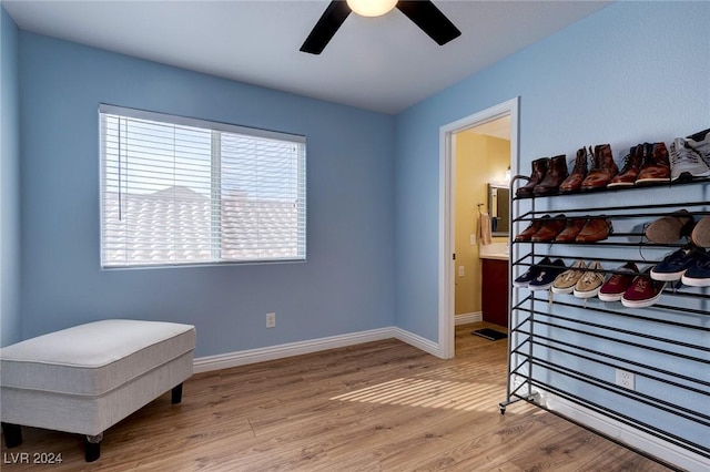 bedroom with hardwood / wood-style floors and ceiling fan