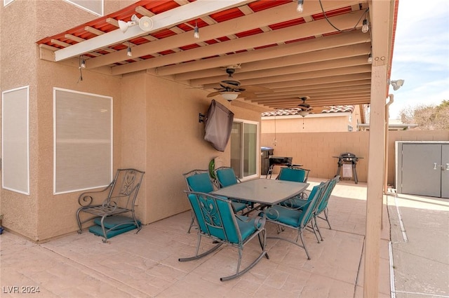 view of patio featuring grilling area and ceiling fan