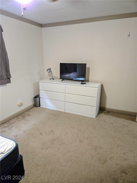 unfurnished bedroom featuring light colored carpet