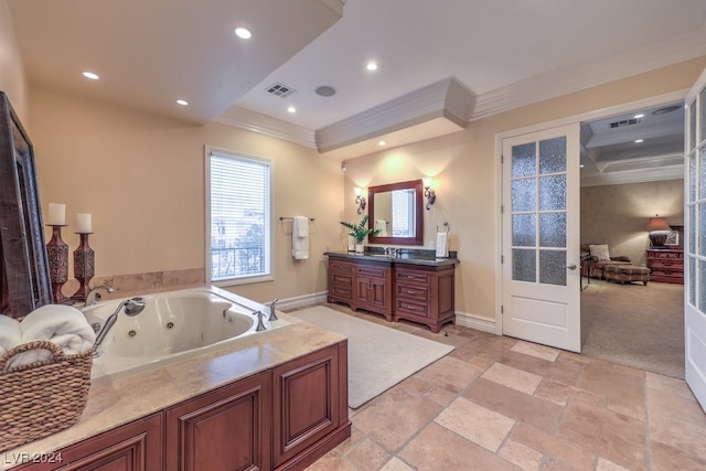 bathroom featuring vanity, a bathtub, crown molding, and french doors