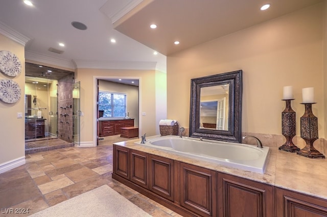 bathroom featuring crown molding and independent shower and bath