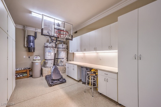 garage featuring secured water heater