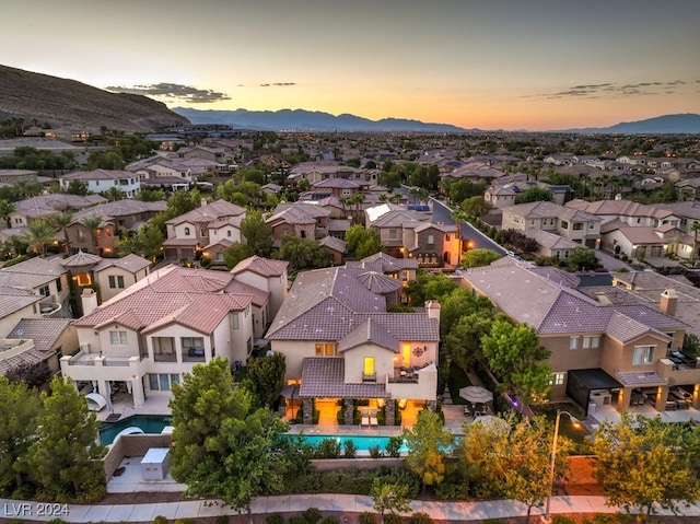 aerial view at dusk with a mountain view