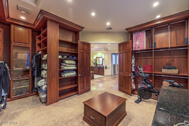 office featuring light colored carpet and ornamental molding