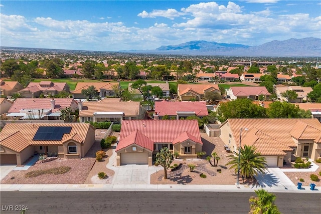 bird's eye view with a mountain view