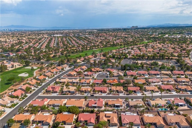 birds eye view of property featuring a mountain view