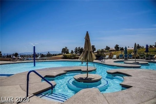 view of swimming pool featuring a patio