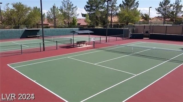 view of tennis court with basketball court