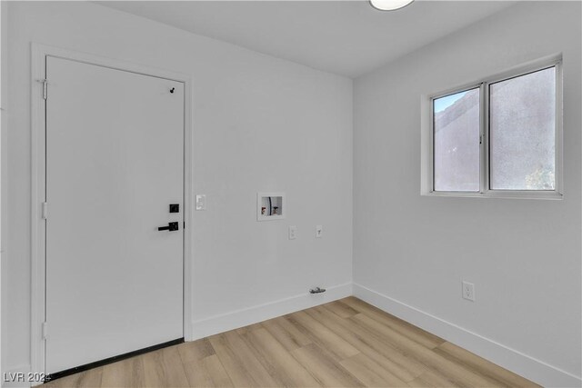 interior space featuring light hardwood / wood-style flooring and washer hookup