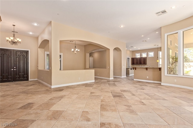 interior space with an inviting chandelier