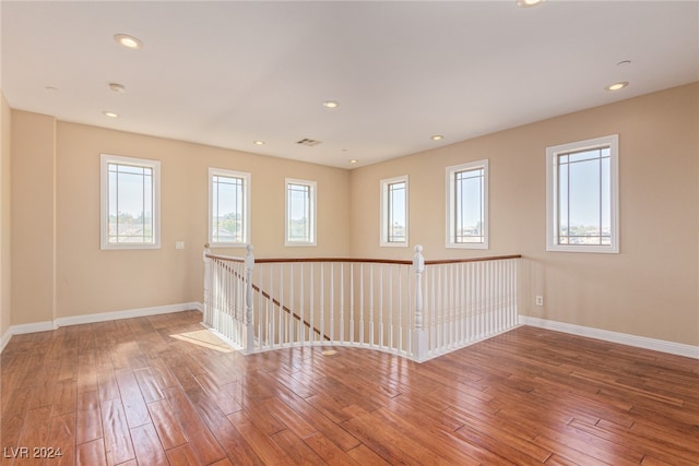 spare room featuring hardwood / wood-style floors