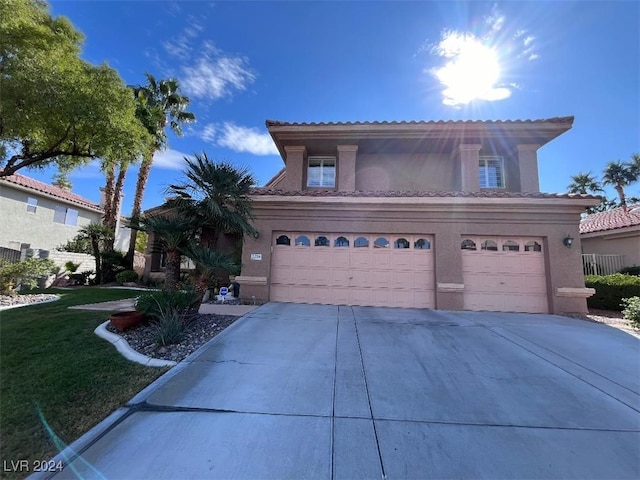 2208 Fiero Dr, Las Vegas, NV 89134 - view of front of property with stucco siding, concrete driveway, a garage, and a tiled roof