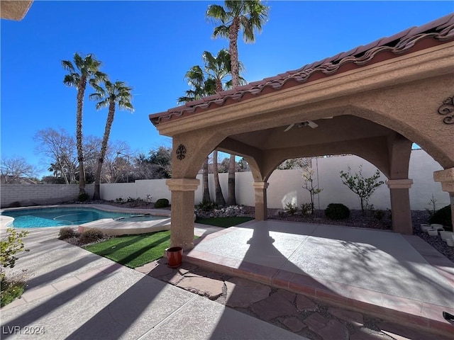 view of patio / terrace featuring a fenced in pool