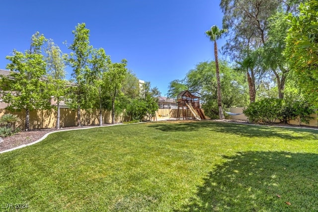 view of yard featuring a playground