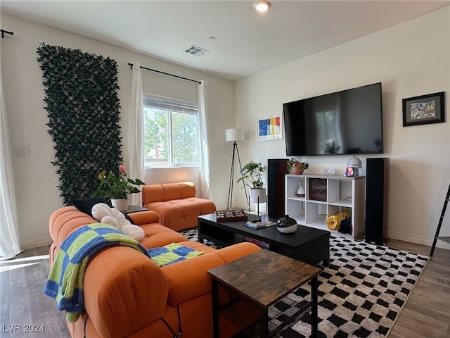 living room with dark hardwood / wood-style floors