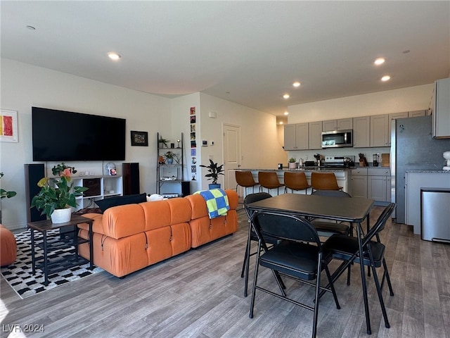 dining room featuring light hardwood / wood-style floors